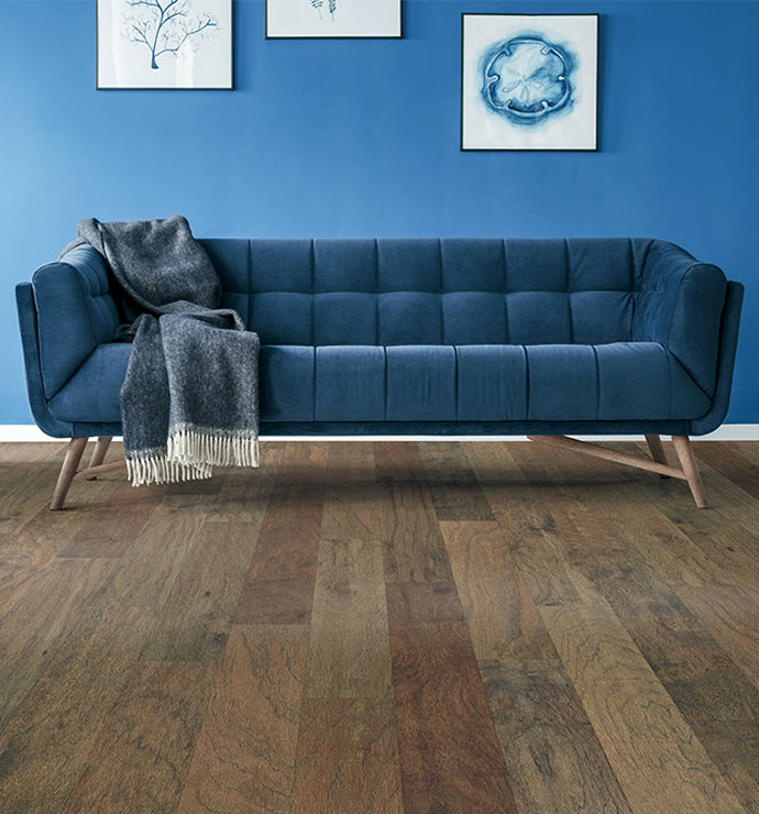 Blue couch on wood | Hurricane Floor Covering & Design